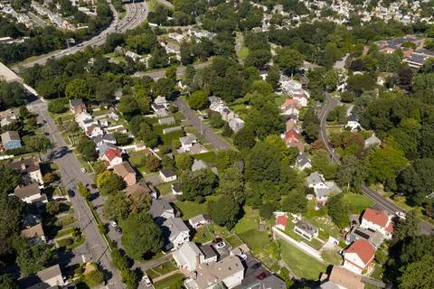 Dense green tree canopy across suburban White Plains in Westchester County, New Stock Photos