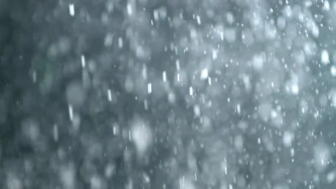 A dense heavy blizzard snowstorm VFX insert in slow-motion on black screen. Stock Footage 303661979