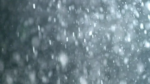 A dense heavy blizzard snowstorm VFX insert in slow-motion on black screen. 動画素材 303661992