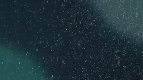 A dense heavy blizzard snowstorm VFX insert in slow-motion on black screen. Stock Footage 303662018