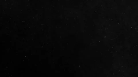A dense heavy blizzard snowstorm VFX insert in slow-motion on black screen. Stock Footage 310873045
