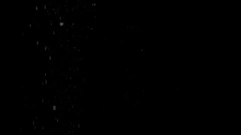 A dense heavy blizzard snowstorm VFX insert in slow-motion on black screen. Stock Footage 310873150