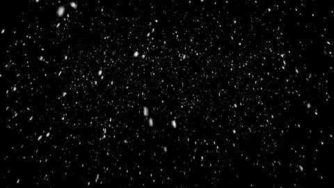 A dense heavy blizzard snowstorm VFX insert in slow-motion on black screen. Stock Footage 310873217