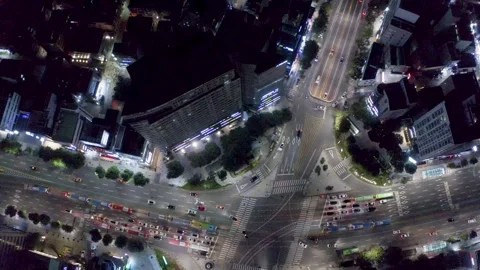 Dense Highrise District With Busy Night Intersection, Drone Overhead View Stock Footage 345268300