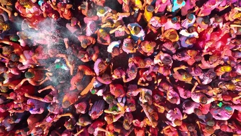 Dense Holi Celebration Crowd Covered in Color Powder Festival Scene Stock Footage 329503946