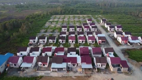 Dense housing that is neatly arranged with the texture of rice fields Stock Footage 249746419