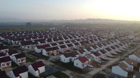Dense housing that is neatly arranged with the texture of rice fields Stock Footage 249746594