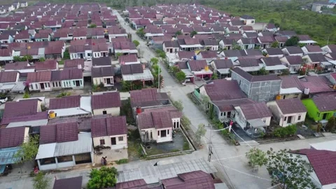 Dense housing that is neatly arranged with the texture of rice fields Stock Footage 249747309