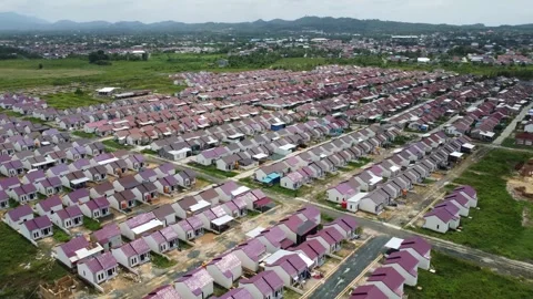 Dense housing that is neatly arranged with the texture of rice fields Stock Footage 268852730
