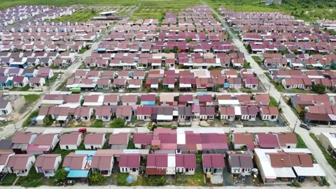 Dense housing that is neatly arranged with the texture of rice fields Stock Footage 268853878