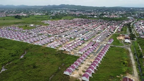 Dense housing that is neatly arranged with the texture of rice fields Stock Footage 268861951
