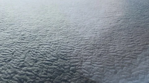 Dense layer of cumulus clouds, top view from airplane window Stock Footage 303492848