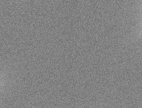 Dense monochrome static pattern creates a gritty noisy surface reminiscent .. Stock Photos