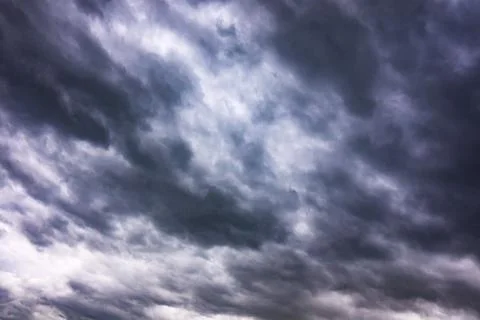 Dense, moody cloud formation dominates the sky before a storm Photos