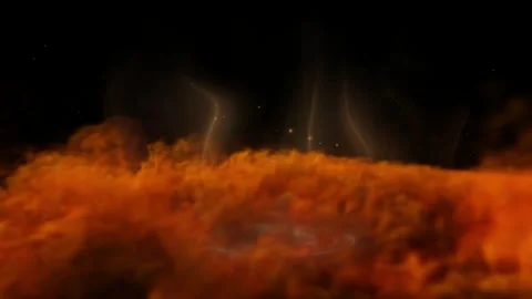 Dense orange fog rolling over dark horizon with glowing particles rising into Video stock 345213753