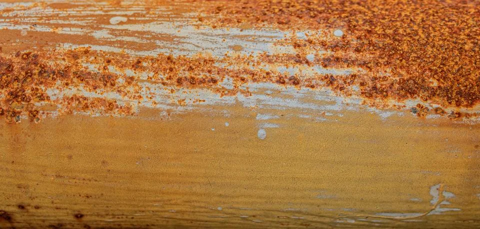 Dense orange rust dots on pipe Stock Photos