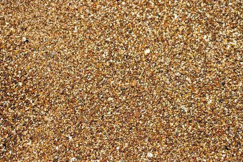 Dense Pebbles on Beach, Close-Up Stock Photos