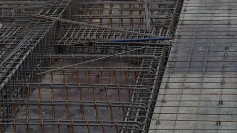 Dense Rebar Reinforcement Grid on Construction Slab Before Concrete Stock Footage 333604047