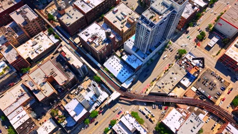 Dense rooftop grid with elevated train line, Chicago, Illinois Stock Footage 341030326