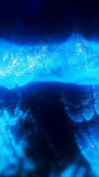 Dense shimmering blue digital particles forming a glowing wave-like structure Illustrazione stock