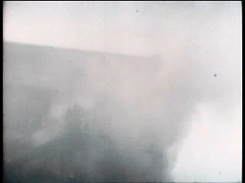 Dense smoke stream out of windows in a building fire in NYC in 1942, Stock Footage 75329607