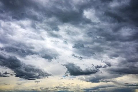 Dense storm clouds dominate the sky Stock Photos
