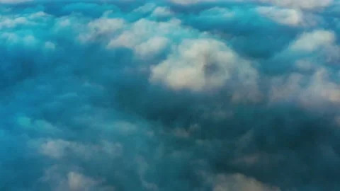 Dense storm clouds float below. Stock Footage 148783123