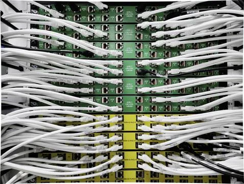 Dense Structured Network Cabling in Data Centre Patch Panel Stock Photos