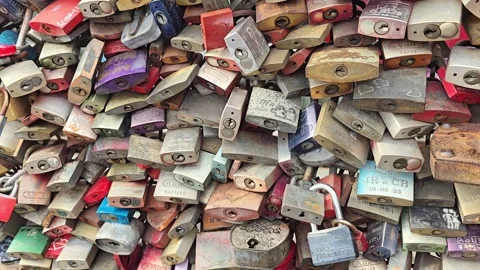 Dense texture of colorful love locks on a bridge railing Stock Footage 345096941