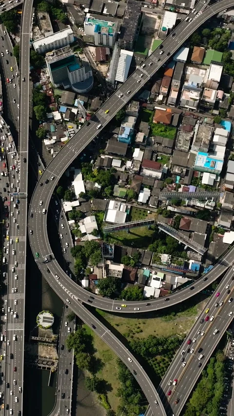 Dense traffic on highway surrounded by buildings. Bangkok, Thailand. Stock Footage 301942563