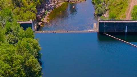 Dense Tropical Forest In River Lerez Reservoir And Dam Stock Footage 318232010