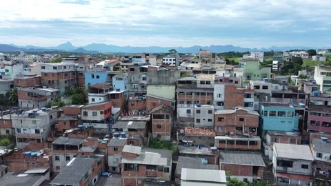 Dense urban housing rooftops in a hillside community. Vidéo 327624076
