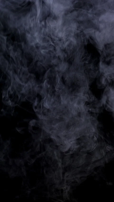 Dense vapor cloud rises and disperses against a black background Stock Footage 345025099