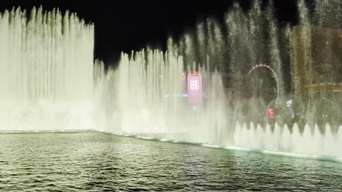 Dense Wall of Bellagio Fountain Jets Fills Illuminated Night Scene 스톡 동영상 344907191