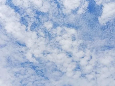Dense White Cloud Pattern in Blue Sky Stock Photos