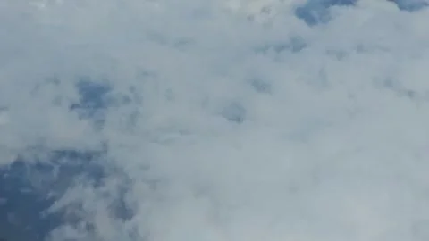 Dense White Clouds Seen from Passenger Airplane Window Stock Footage 341035928