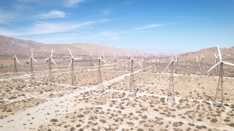 Dense Wind Turbine Field Across Desert Pass, 4K Stock Footage 197018033
