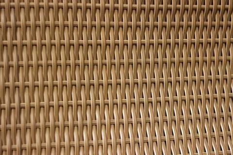 Dense woven rattan texture with repeating geometric pattern 스톡 사진
