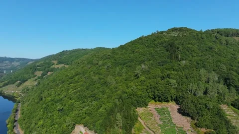 Densely Covered Mountains Over O Saviñao Town Stock Footage 285759641