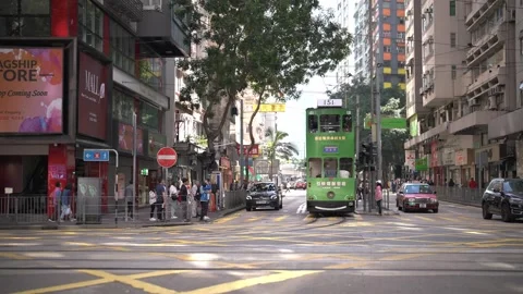 The densely packed buildings and roads of Hong Kong captured by a drone Stock Footage 256809891