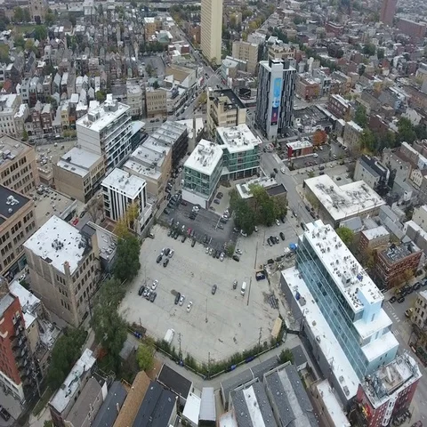 Densely popluated neighborhood intersection Stock Footage 69471679