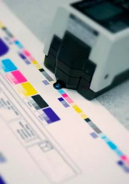 DENSITOMETER CHECKING COLOUR OF PRINT PROCESS Stock Photos