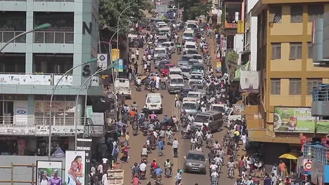 Density image of life, people and vehicles in the City of Uganda Stock Footage 148748075