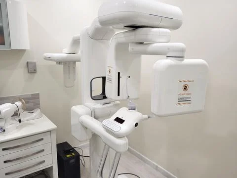 Dental computed tomography scanner in modern clinic. X-ray equipment for pano 写真素材