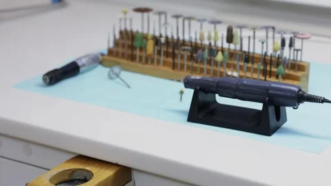 Dental drilling machine and set of heads are on table Stock Footage 276374231