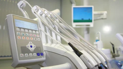 Dental equipment in work on background of laying patient Stock Footage 240016321