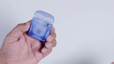 Dental Floss Dispenser In Hand Stock Footage 248753074