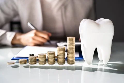 Dental Implant Bill And Financing Stock Photos