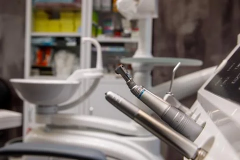 Dental instruments in focus with clinic background Stock Photos