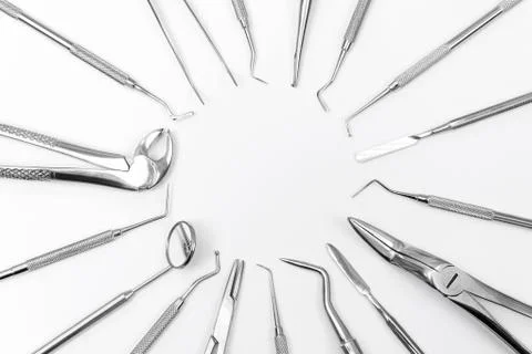 Dental instruments lying in a circle Stock Photos
